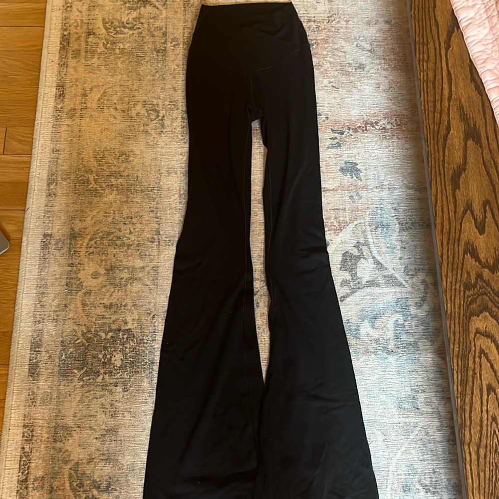 Black crossover flared leggings